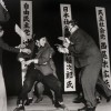 12/10/1960, Yasushi Nagao, Japan, Mainichi Shimbun. A right-wing student assassinates Inejiro Asanuma, Socialist Party Chairman, during his speech at the Hibiya Hall.