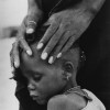 7/1974, Kao, Niger. Ovie Carter, USA, Chicago Tribune. The Faces of Hunger. A mother comforts her child, both victims of drought.