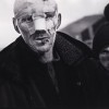 5/4/1999, Kukës, Albania. Claus Bjørn Larsen, Denmark, Berlingske Tidende. A man walks the streets in one of the largest gathering points for ethnic Albanian refugees fleeing violence in Kosovo.