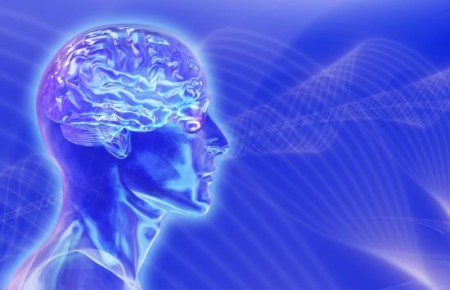 glass male head with brain on brainwaves backgroun